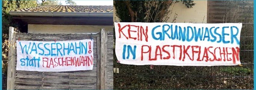 Foto: BI Unser Wasser Lüneburg. Aufgehängte Transparente mit dem Aufruf: Kein Grundwasser in Plastikflaschen - Wasserhahn statt Plastikwahn!