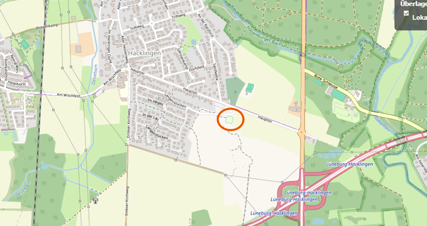 Karte: OpenStreetMap-Mitwirkende. Kartenausschnitt Häcklingen. Etwa da, wo der orangefarbene Kreis ist, befindet sich das neue Baugebiet.